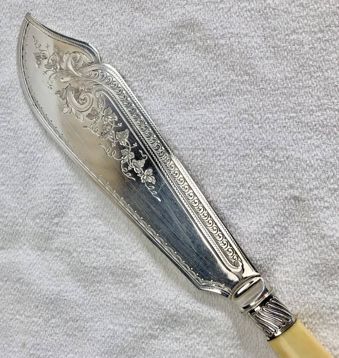 Antique Victorian fish serving cutlery, bone and silver-plated metal