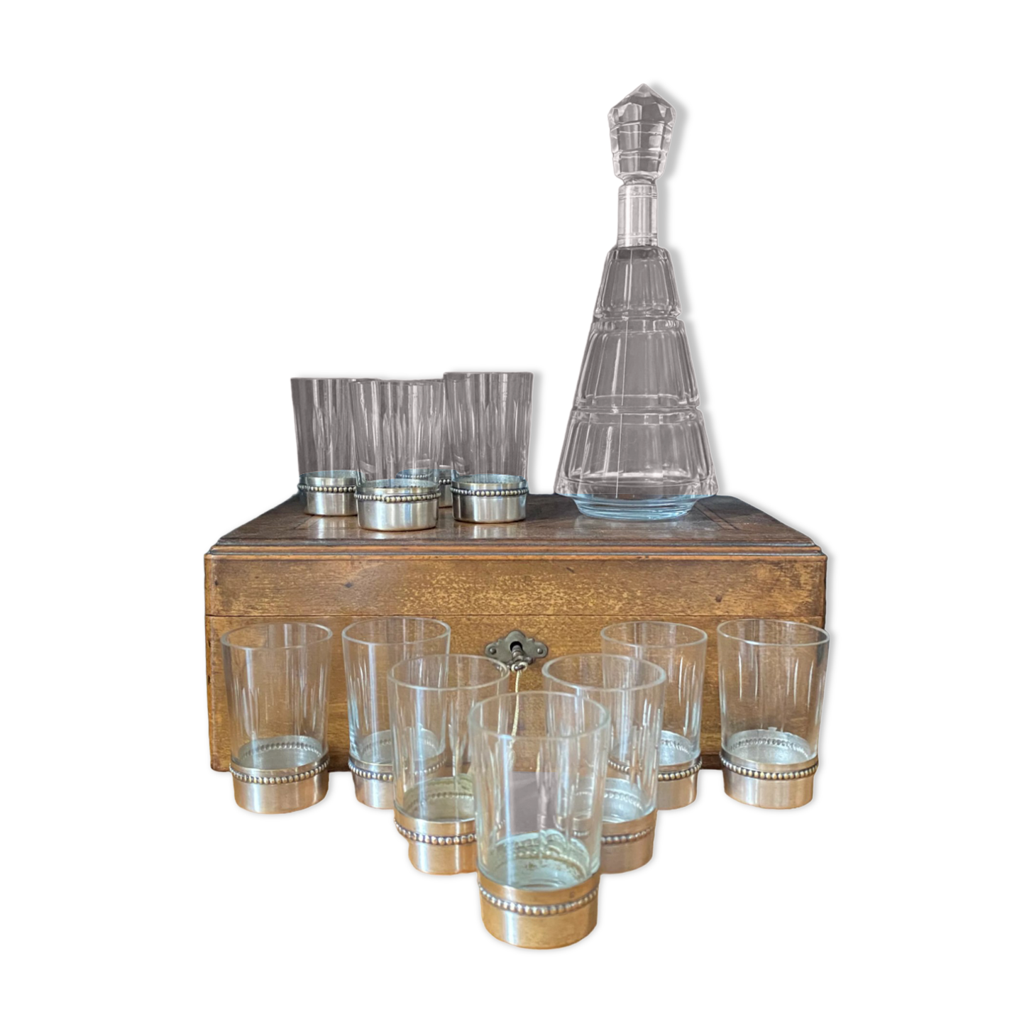 Liquor decanter in crystal and silver metal and matching glasses thereof