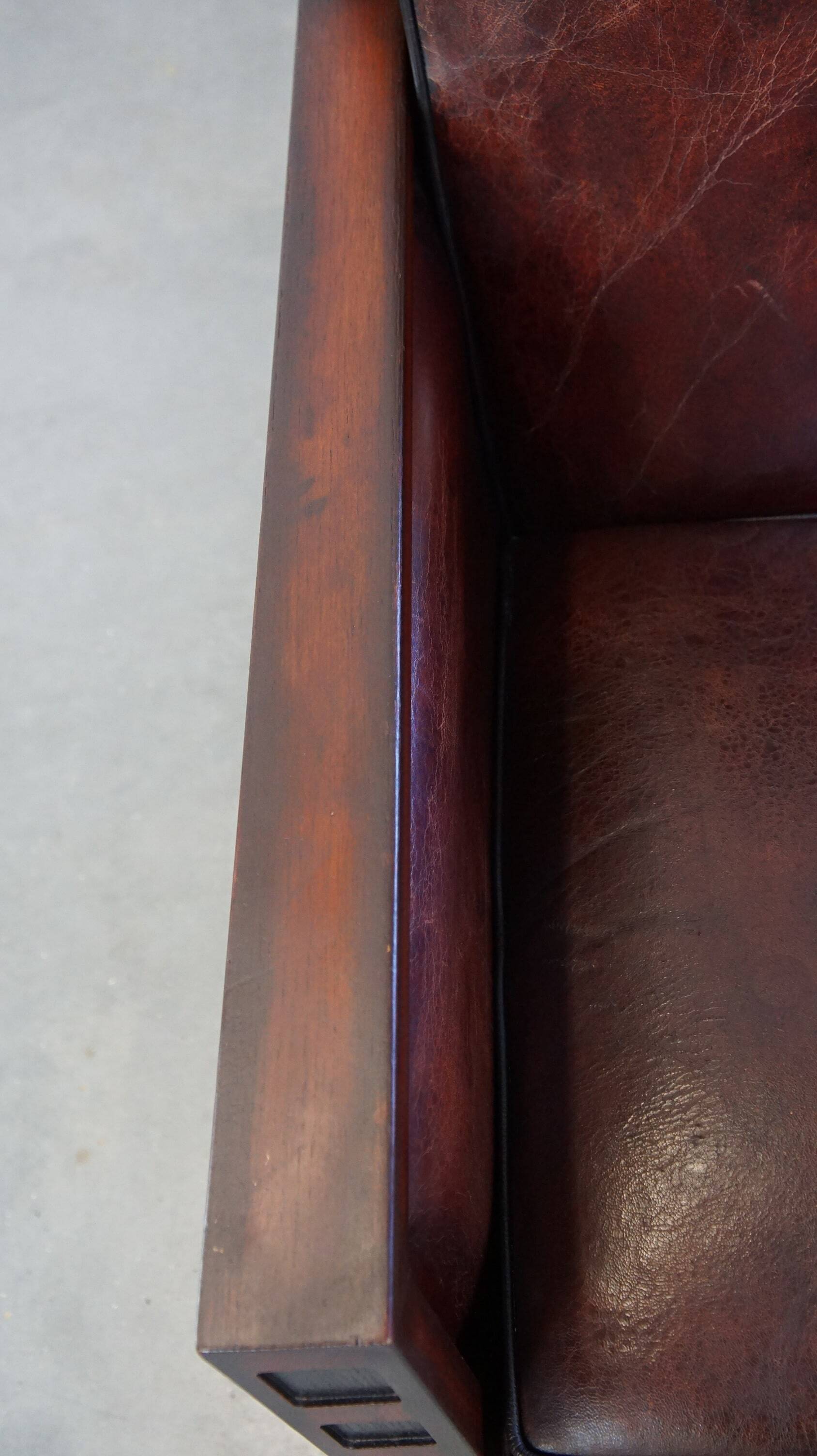 Sheepskin Art Deco design armchair combined with wood