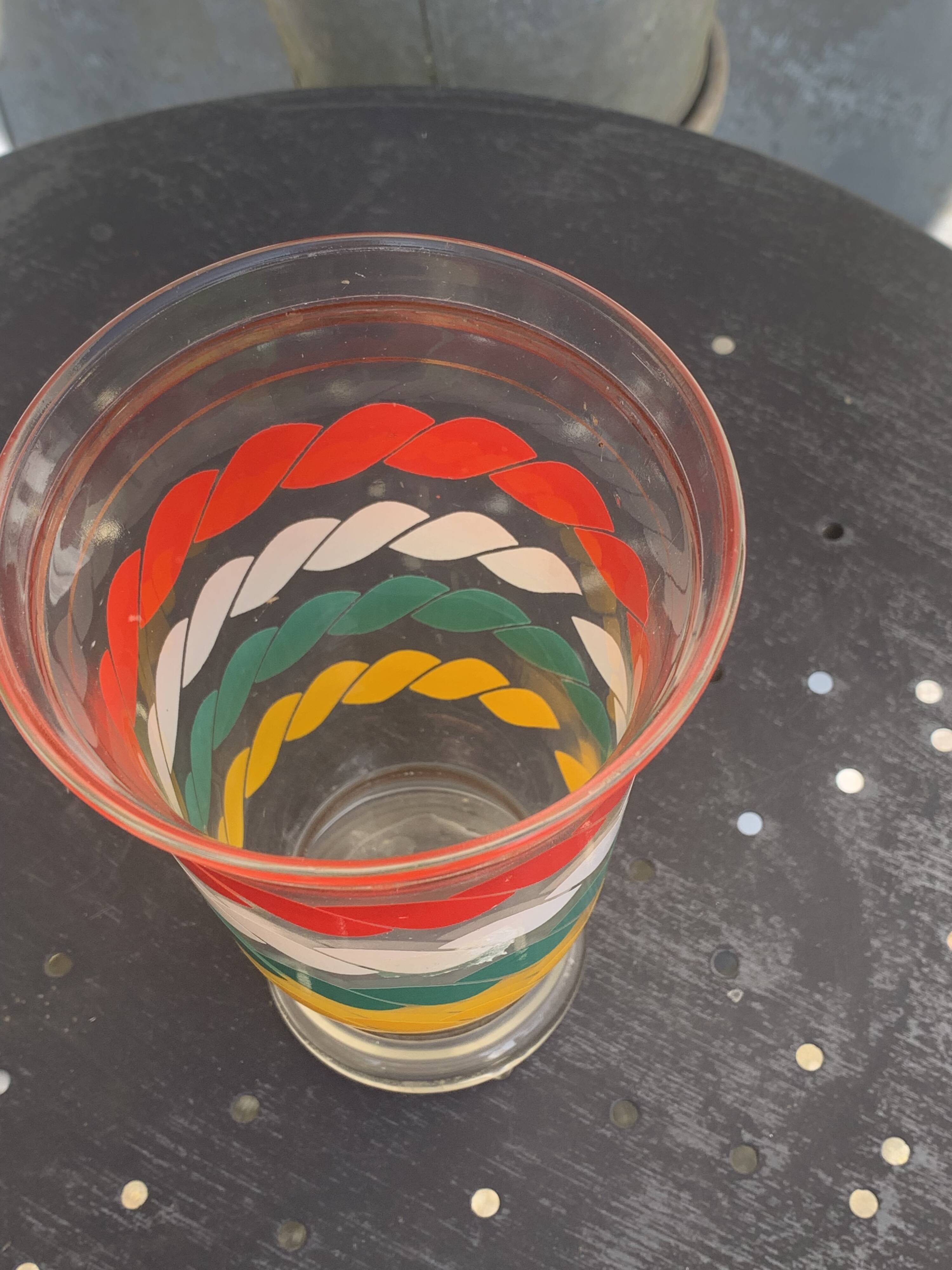 Transparent and gold glass vase and red, white, green and yellow silkscreen lines vintage 1960