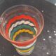 Transparent and gold glass vase and red, white, green and yellow silkscreen lines vintage 1960