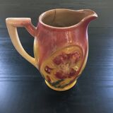 Old pitcher with pink iris decor
