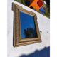 Miroir en bois et stuc doré