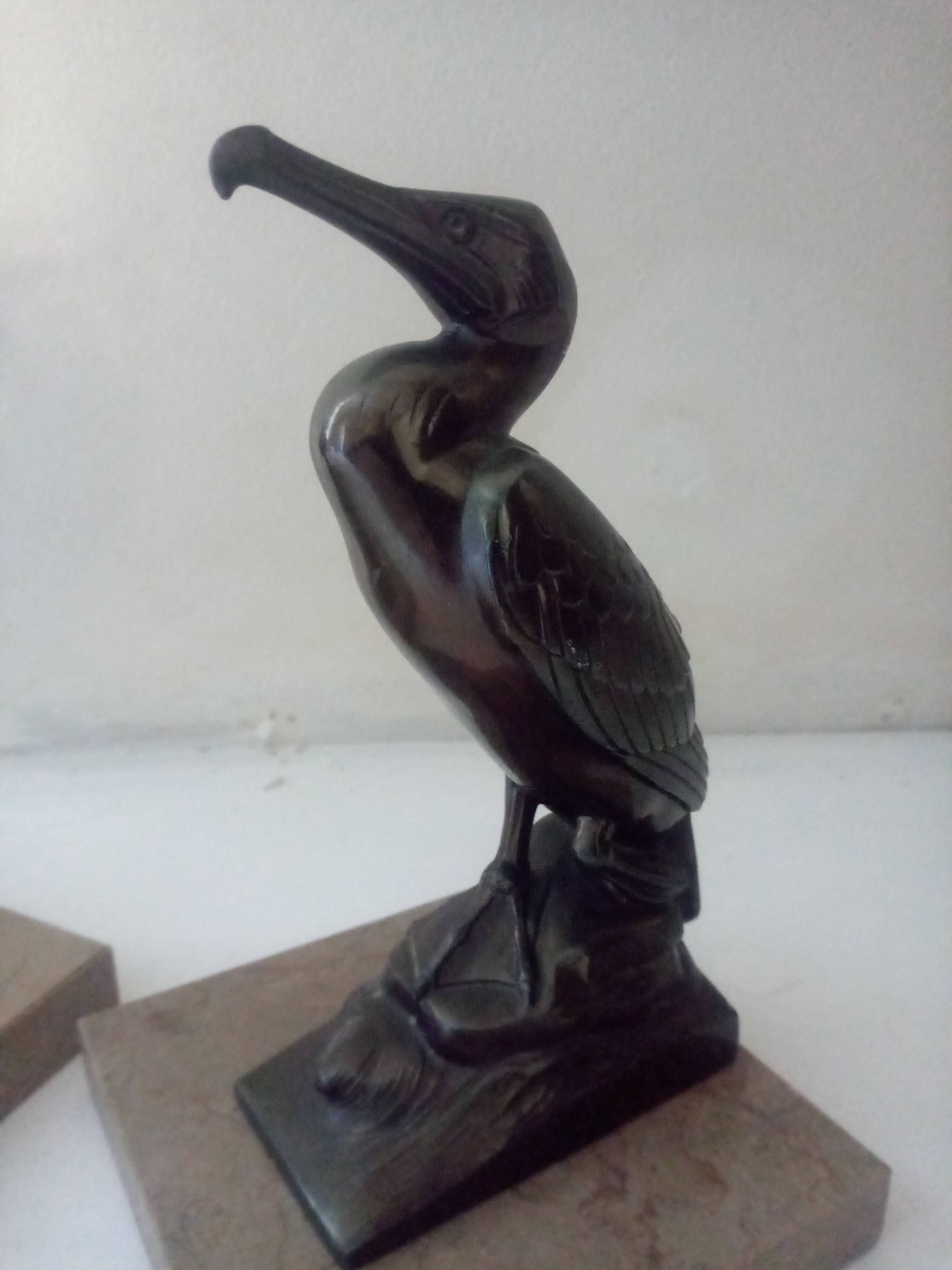 Pelican bookend signed Frecourt