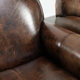 Set of two sheepskin Art Deco design armchairs with beautiful patina
