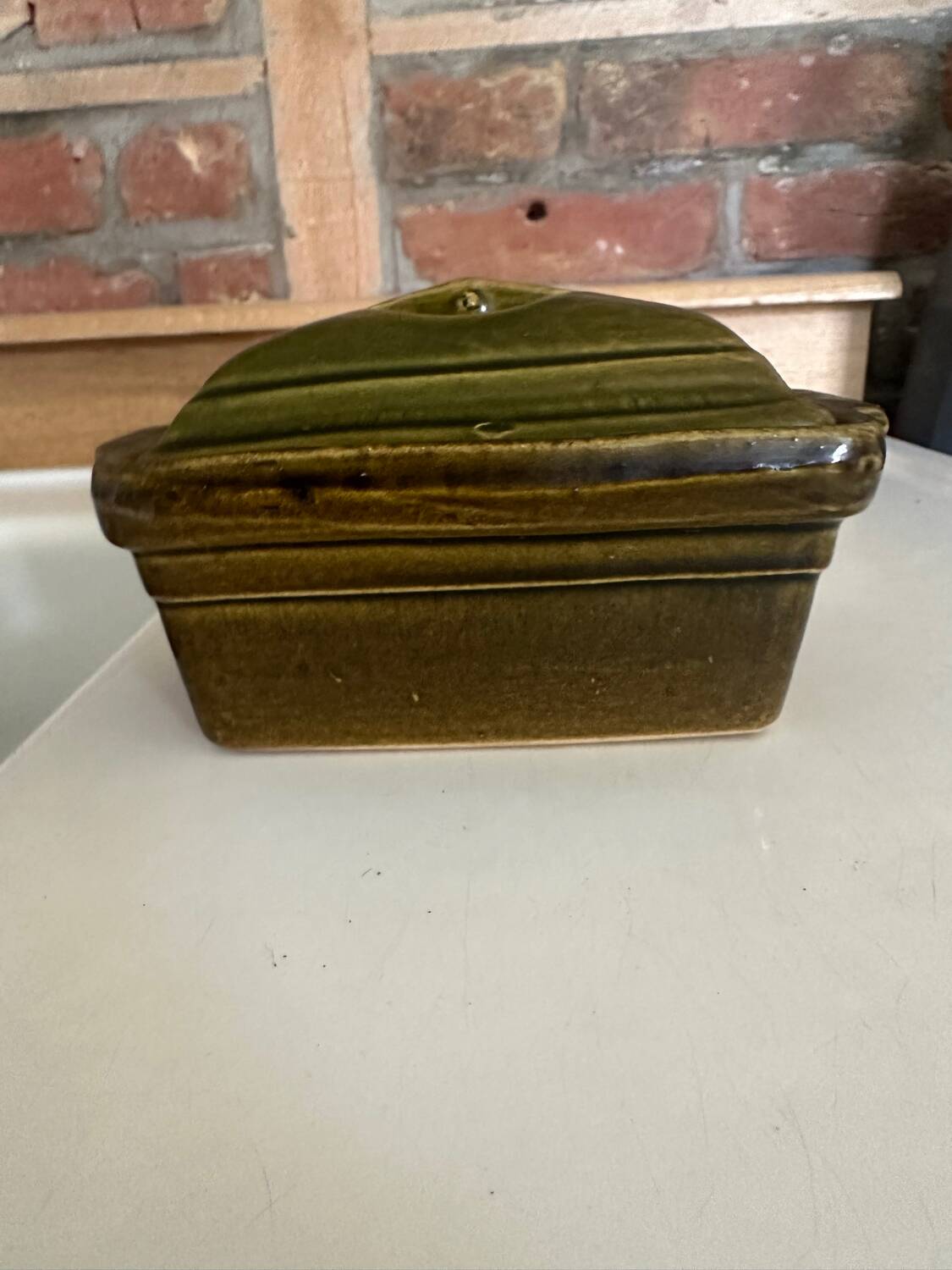 Vintage green majolica butter dish