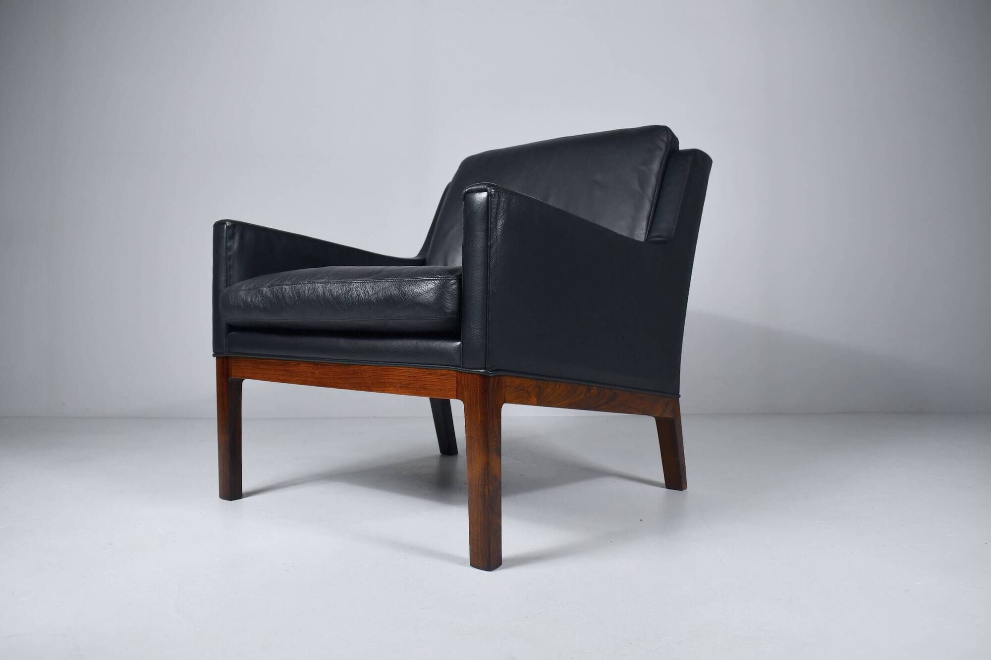 Leather and rosewood armchair by Kai lyngfeldt-Larsen. Denmark
