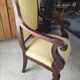 2 antique matching armchairs in wood and fabric