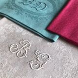 Suite of four antique tinted napkins