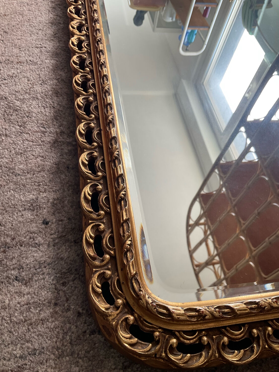 Ancien miroir en bois doré et verre biseauté