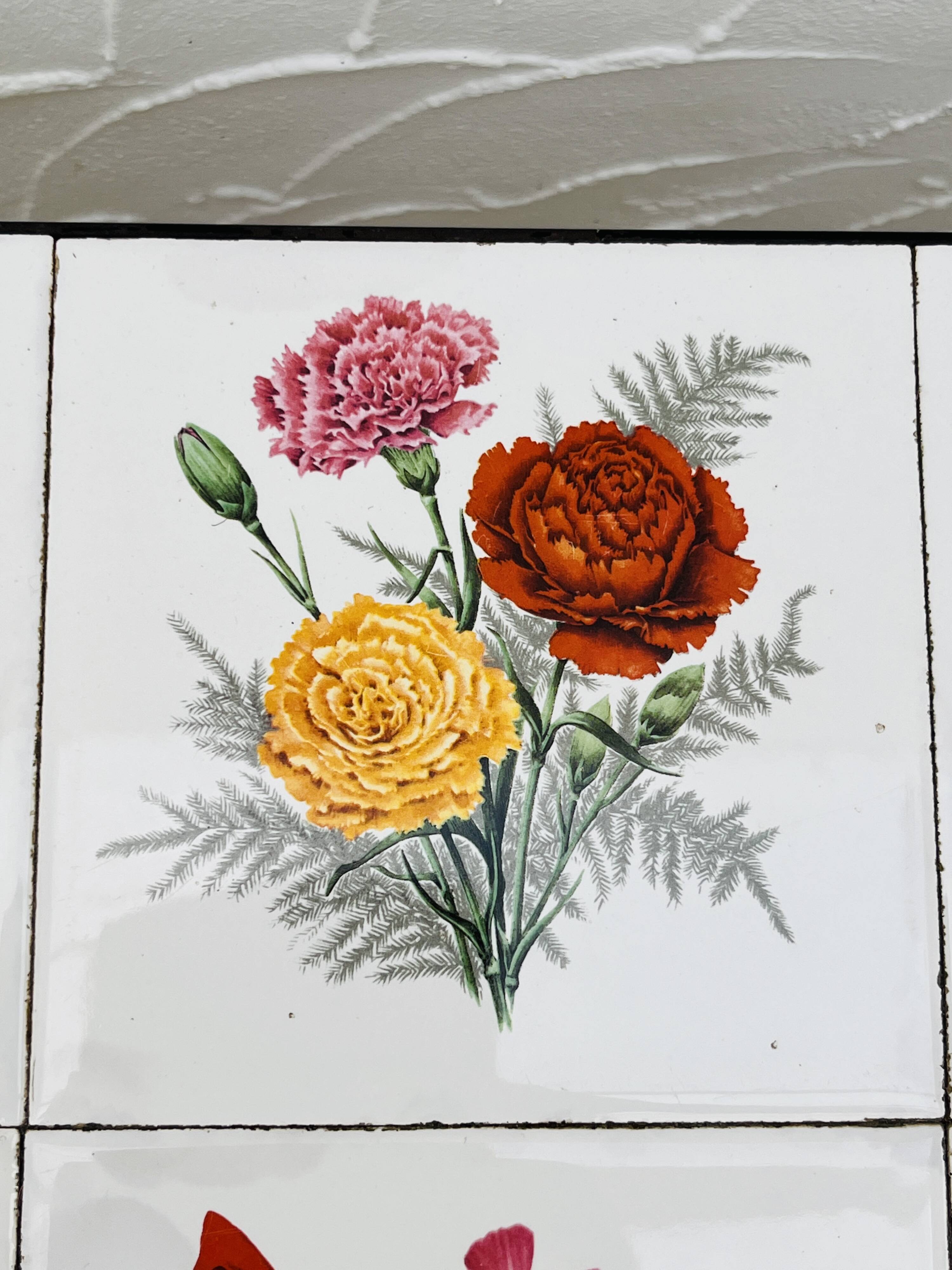 Vintage coffee table in wrought iron with floral tiles.