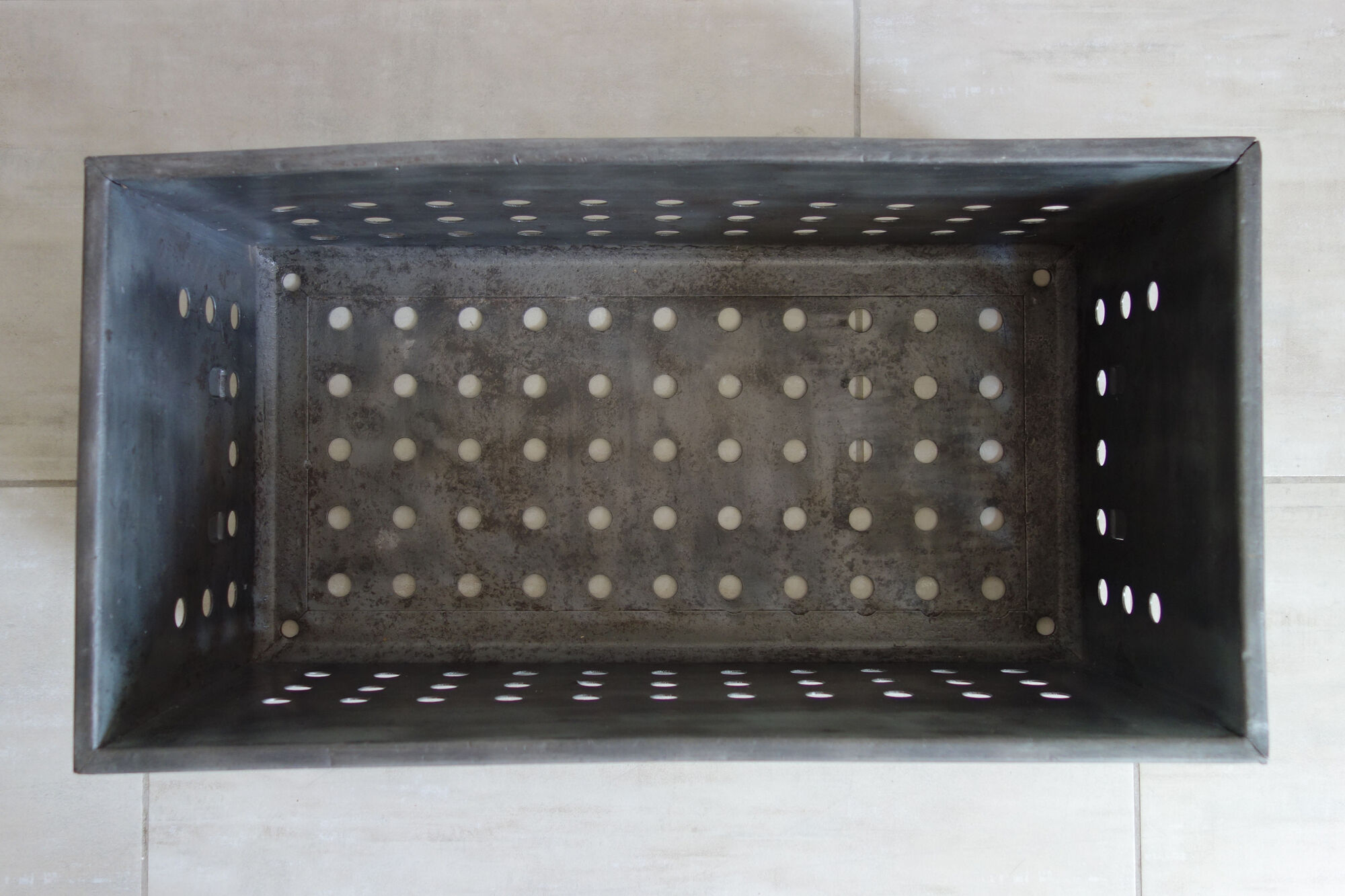 Old industrial box perfoated metal