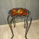 Wrought iron stool and Vallauris pottery signed Leduc.