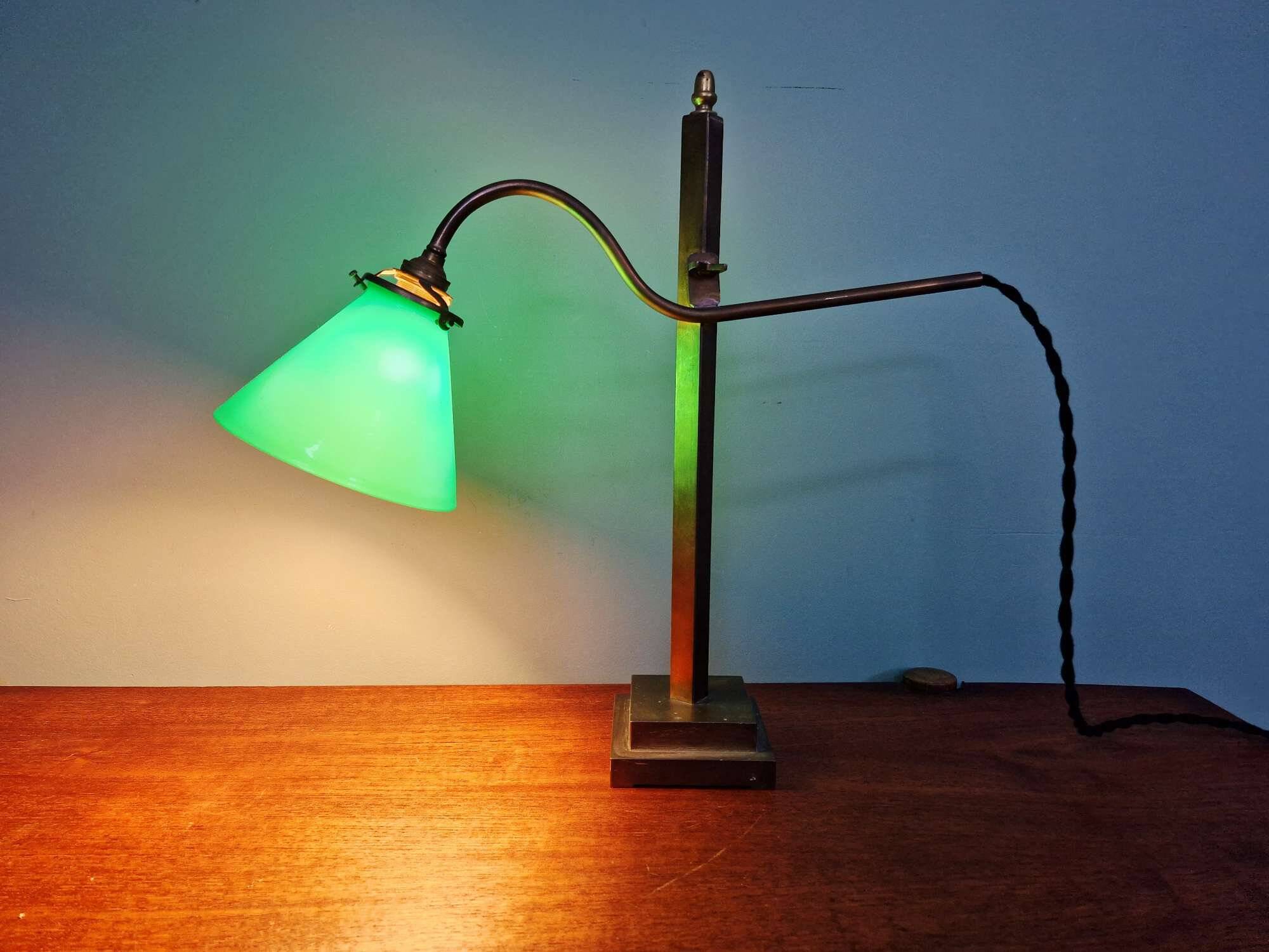 Bronze desk lamp with a green opaline conical shade, 1920.