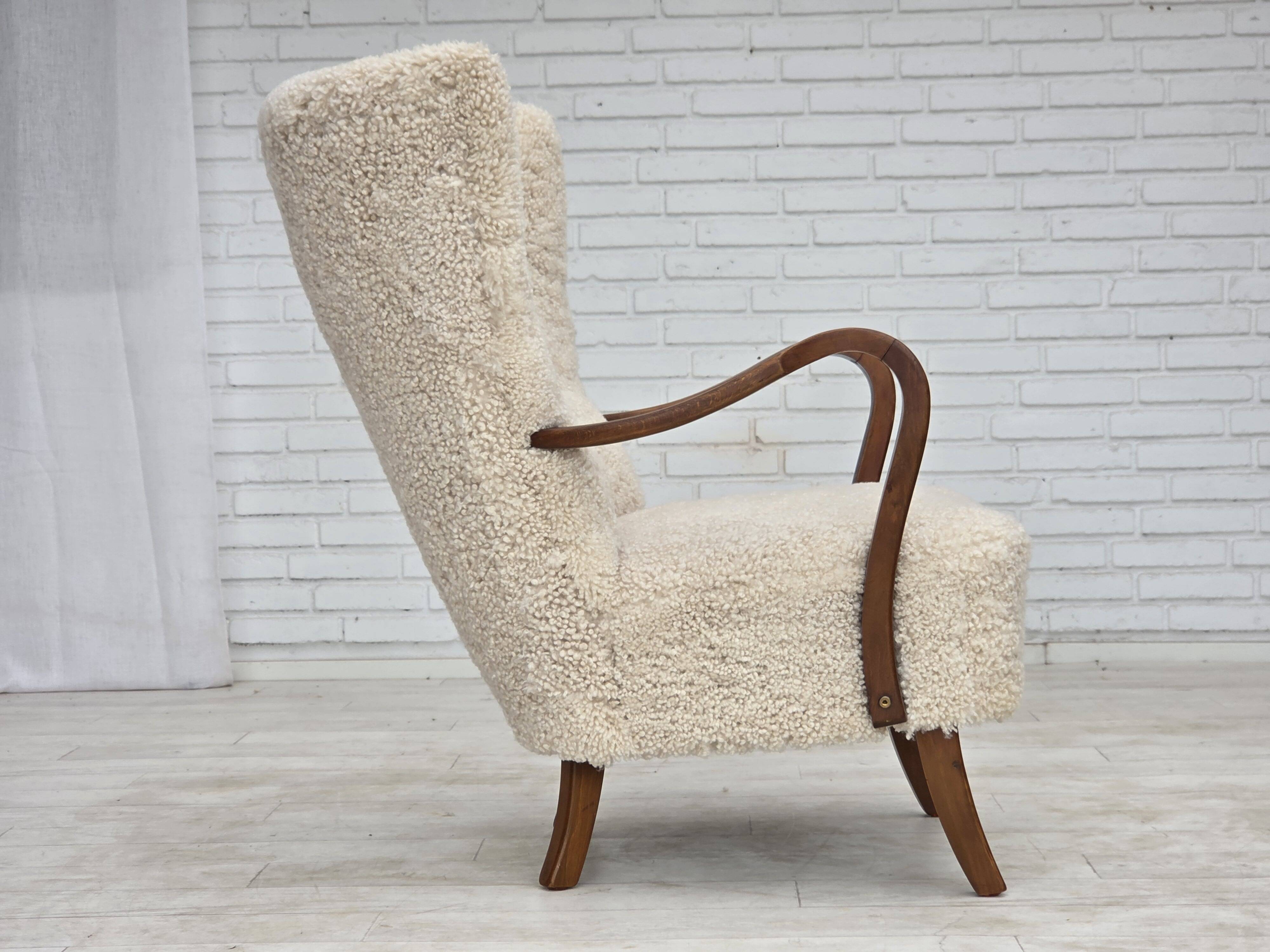 1960s, Danish design by Alfred Christensen, reupholstered, sheepskin.