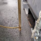 Old vintage gilded side table with marble top