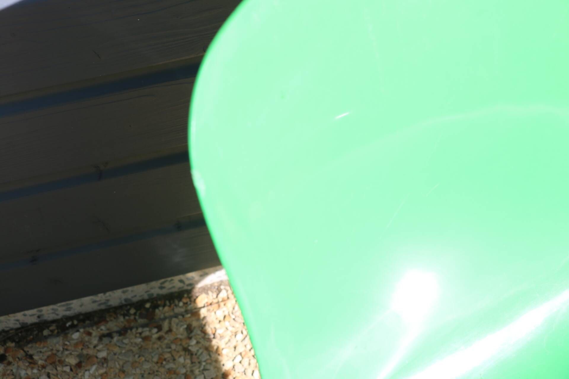 Set of 4 green Selene Magistretti chairs.