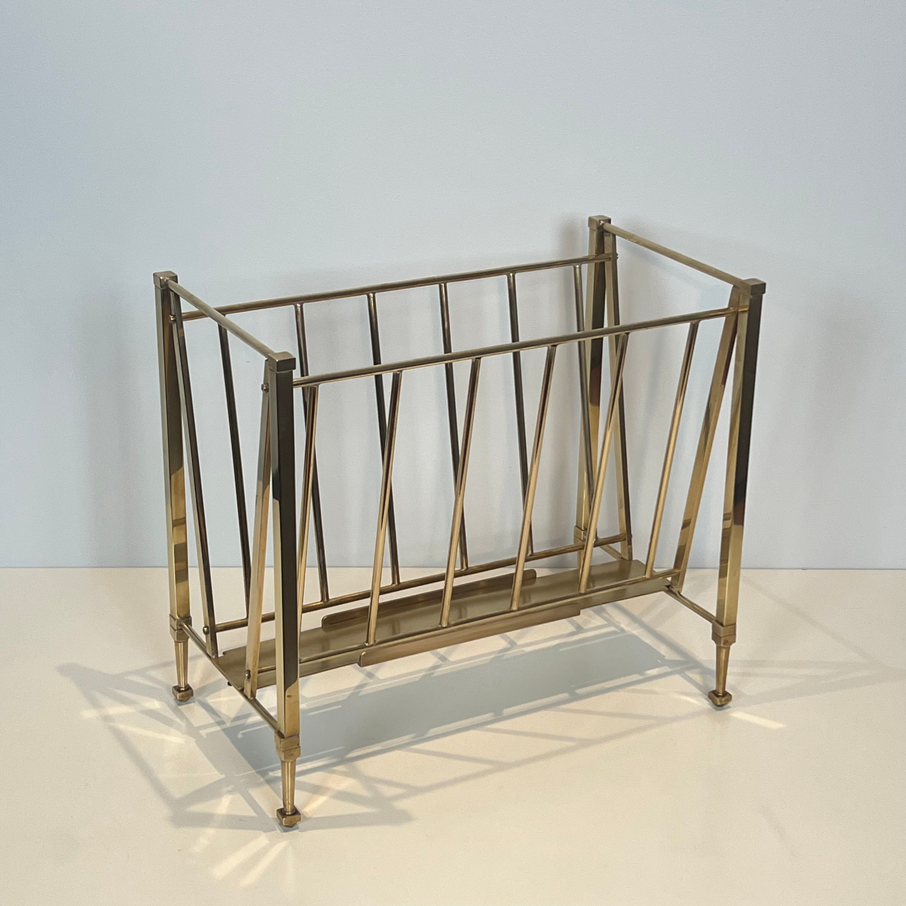 Neoclassical brass magazine rack attributed to Maison Ramsay.