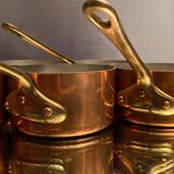 Suite of 12 tinned copper pans