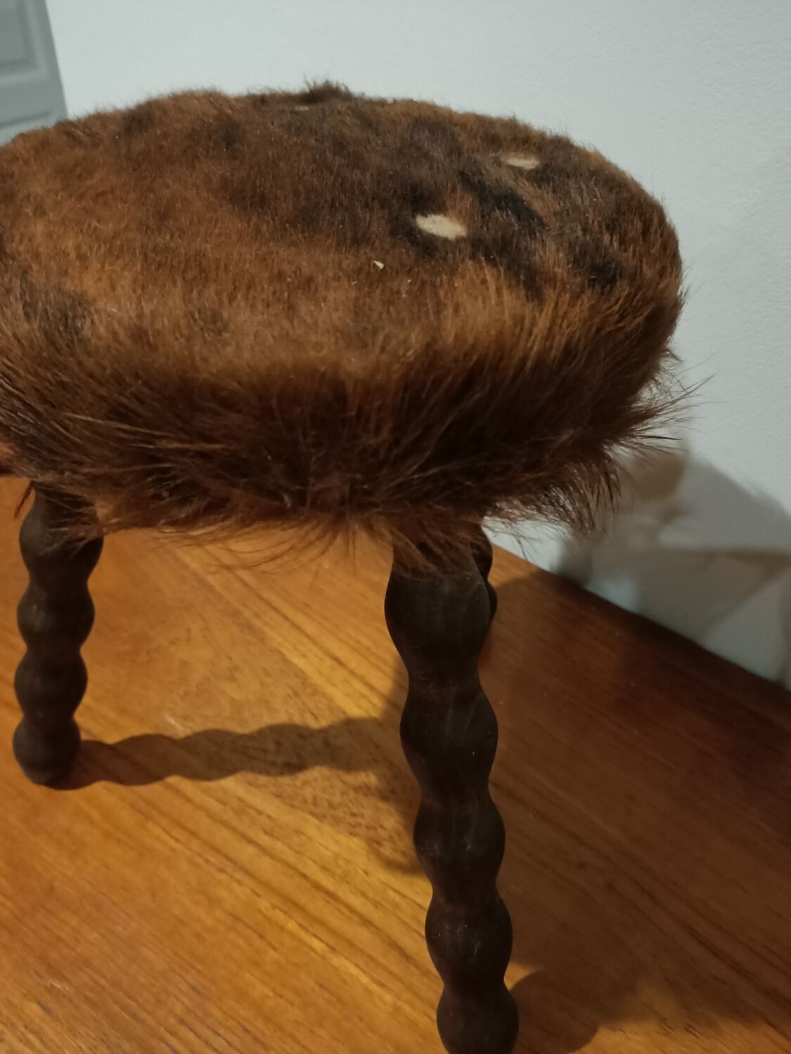 Duo of cowhide stools