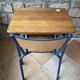 vintage wooden school desk with its chair