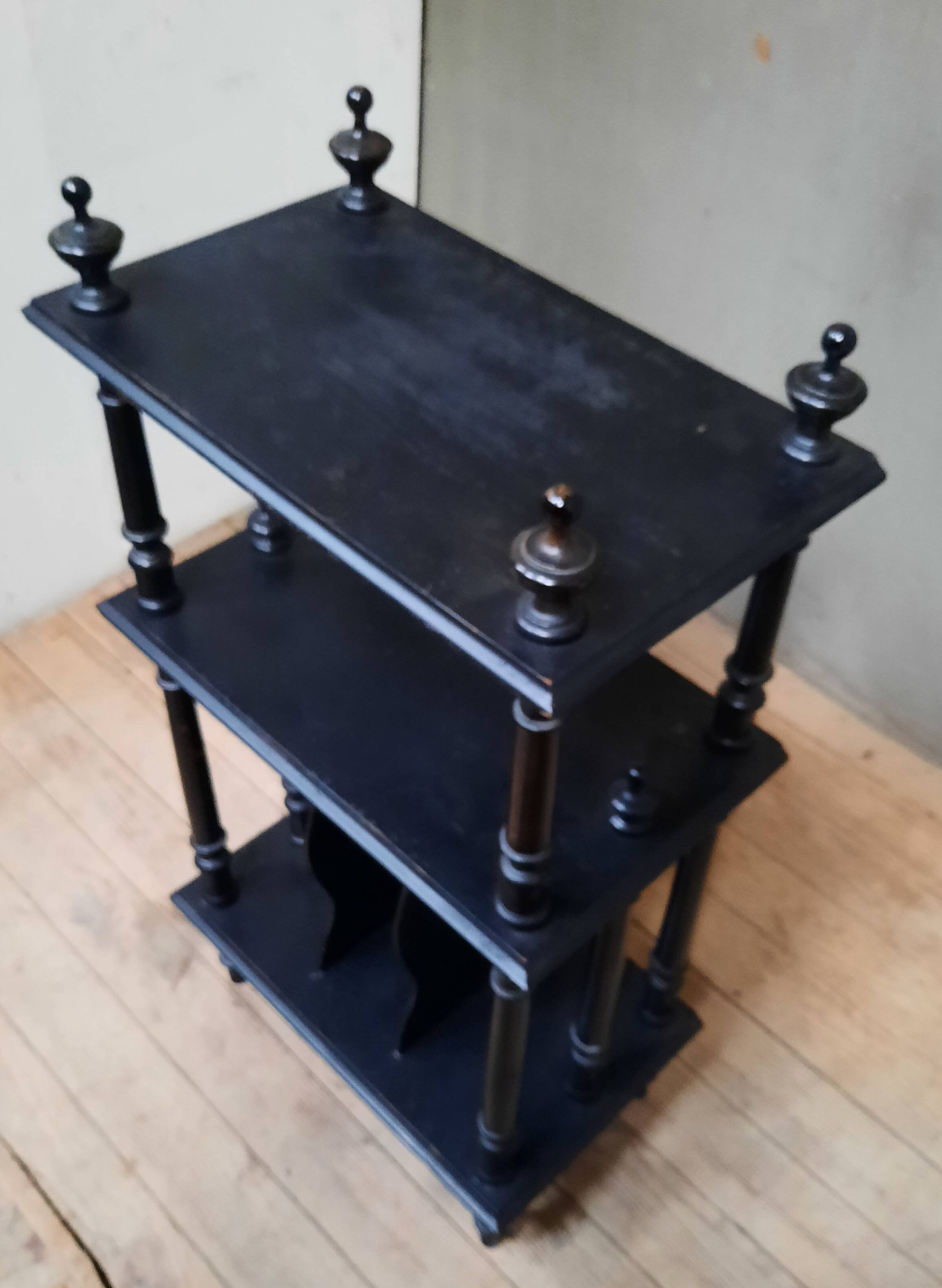 Blackened wooden shelf