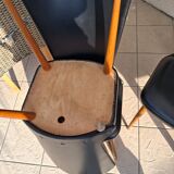 4 black Baumann style chairs