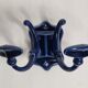 Pair of 1910 art nouveau period coat hooks in blue enameled cast iron