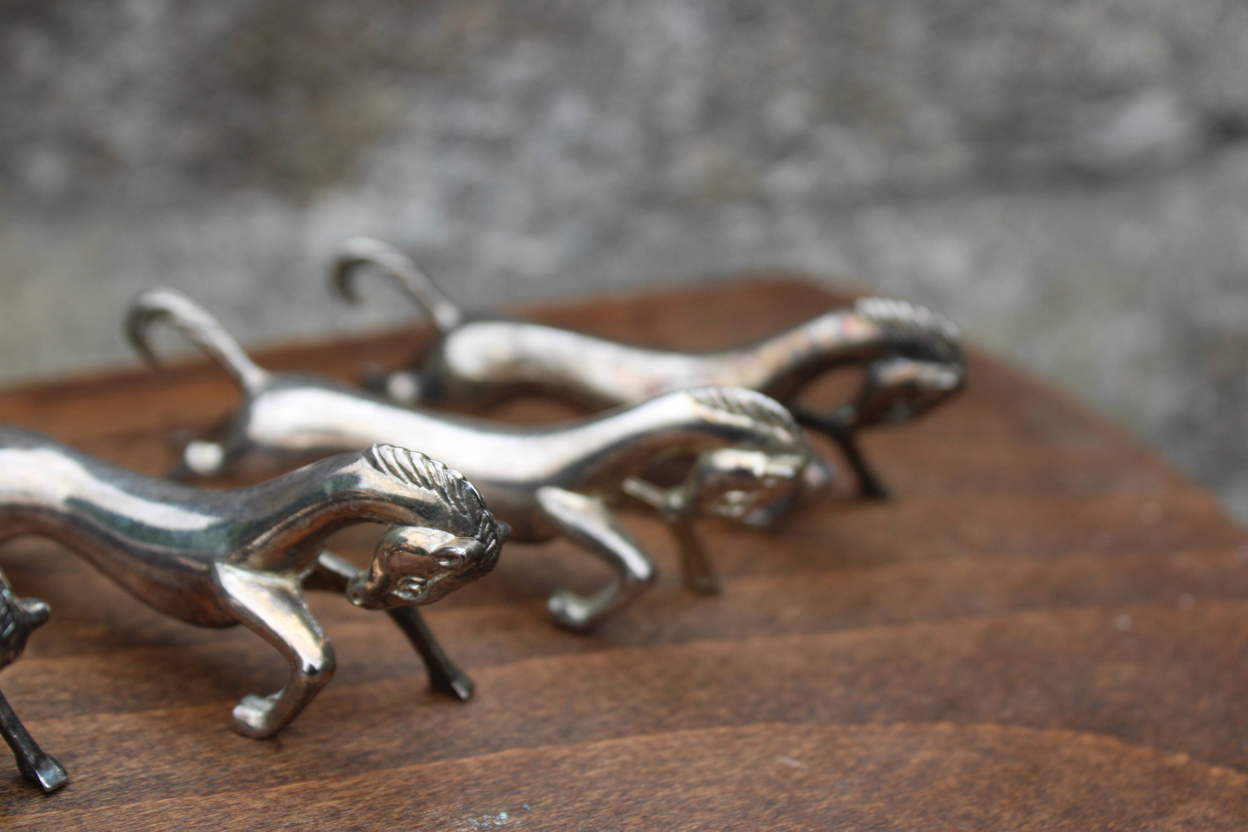 Set of 5 vintage silver metal horse knife rests