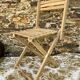 Antique folding chair with wooden slats