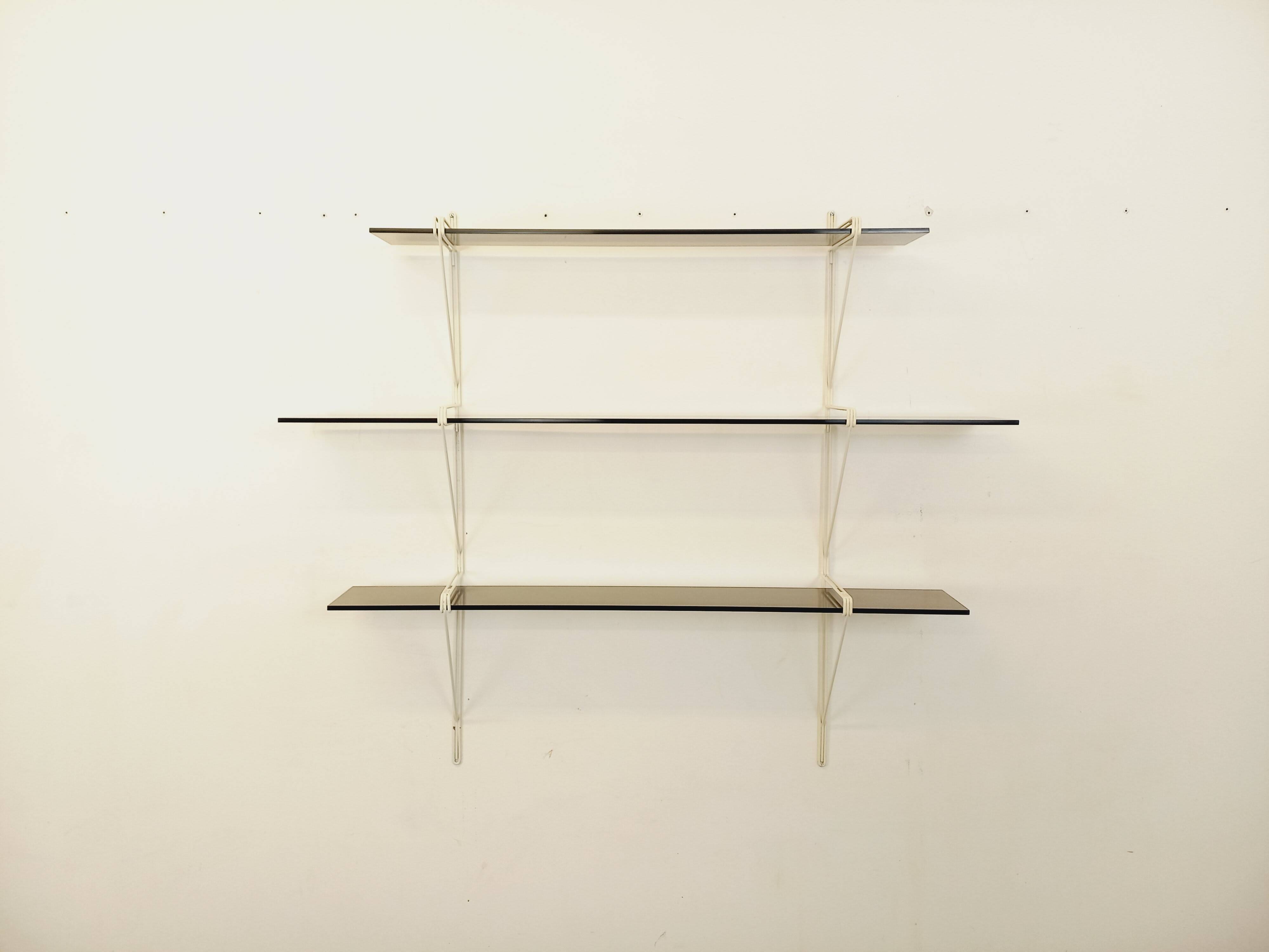 Large vintage wall shelf in smoked glass and white metal in String style.