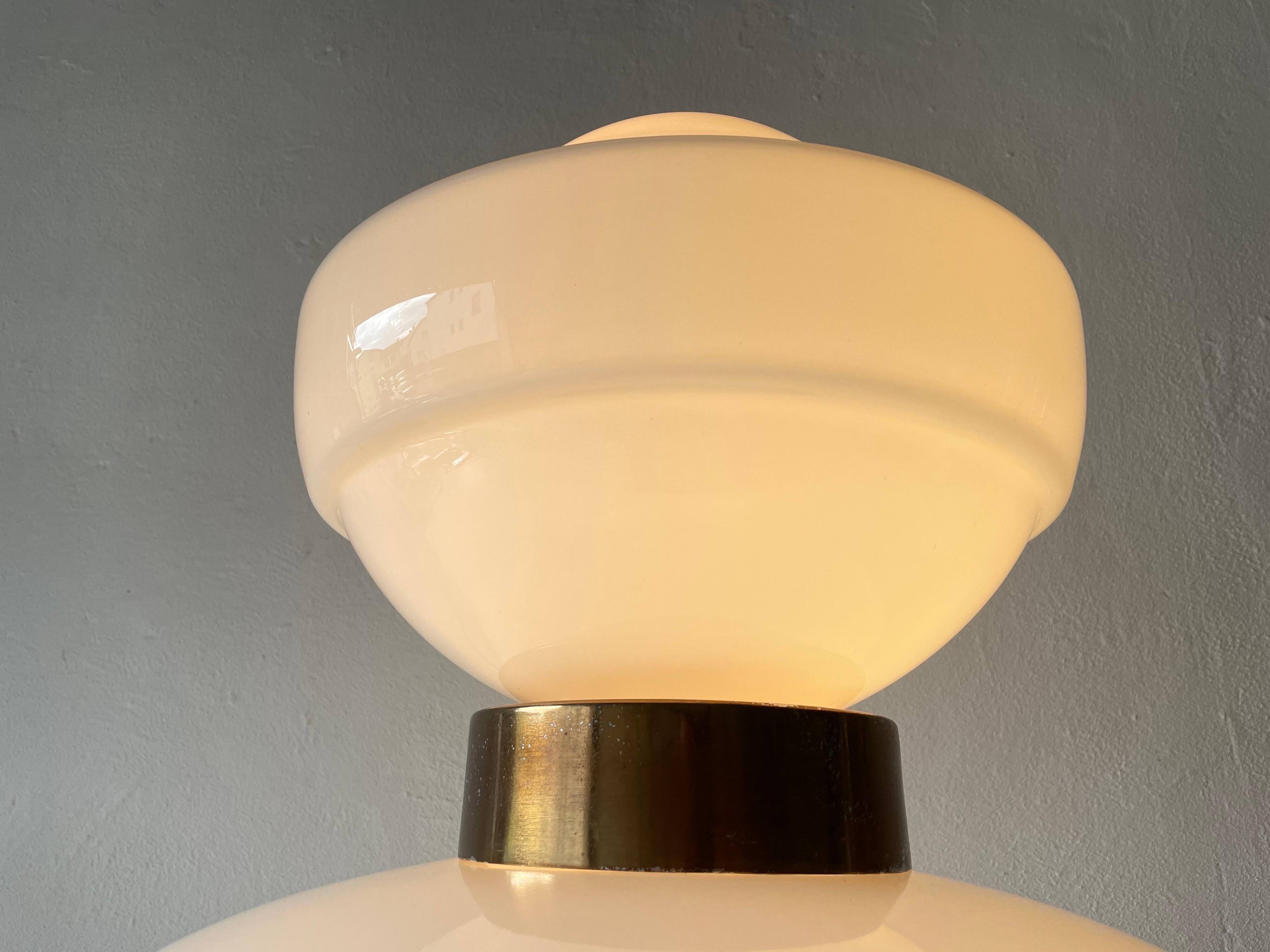 Large table lamp or floor lamp in opal glass and brass body, 1960s, Italy.
