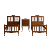 2 beds and a vintage bedside table in solid cherry wood