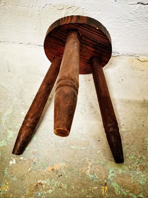 Former tripod farm stool