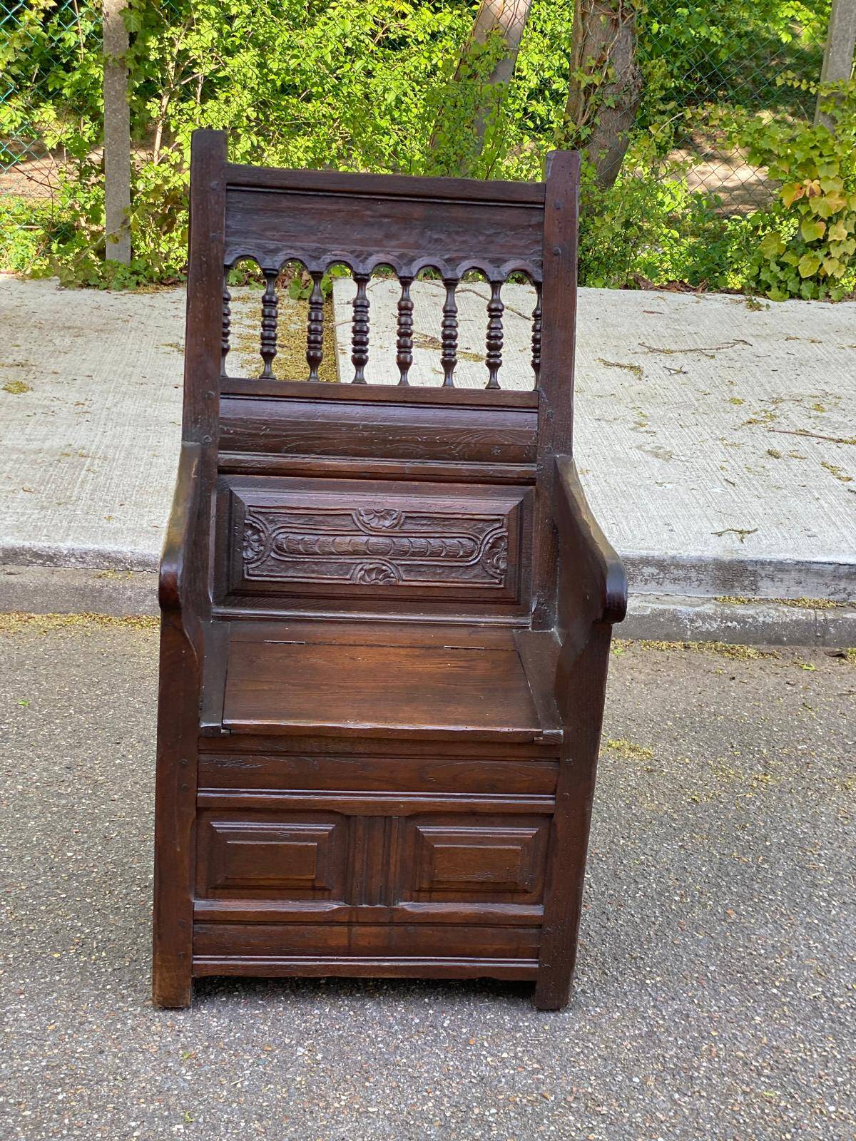 19th-century solid wood cathedral armchair