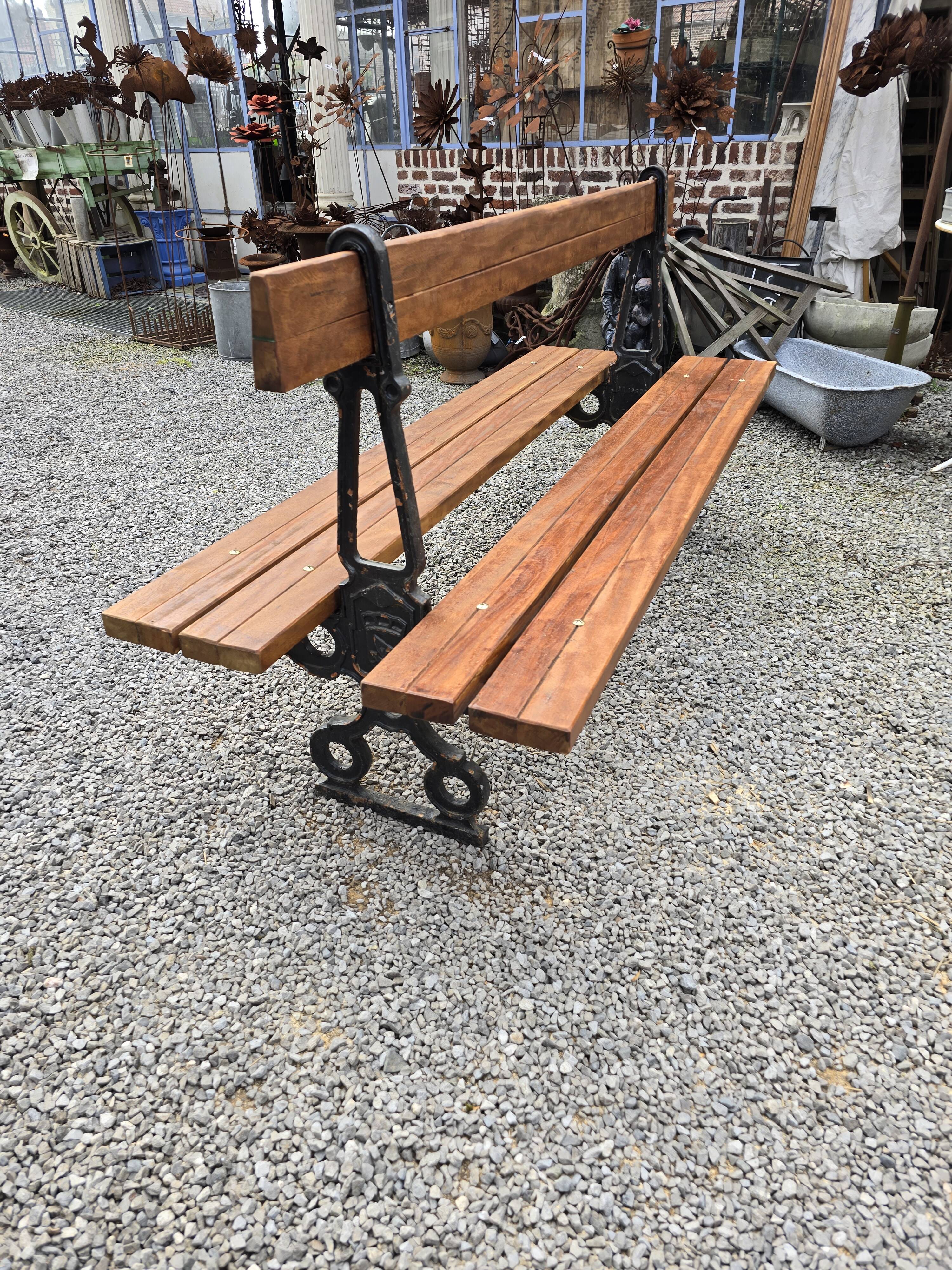 Public garden bench in the city of Paris