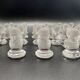 12 Baccarat crystal knife holders, Houdon model, 19th century.