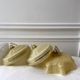 Pair of suspensions in yellow Clichy glass and golden border 40s-50s