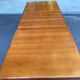 Scandinavian extendable dining table in honey-stained wood for 12 people 1990