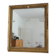Golden stucco and wood Empire mirror