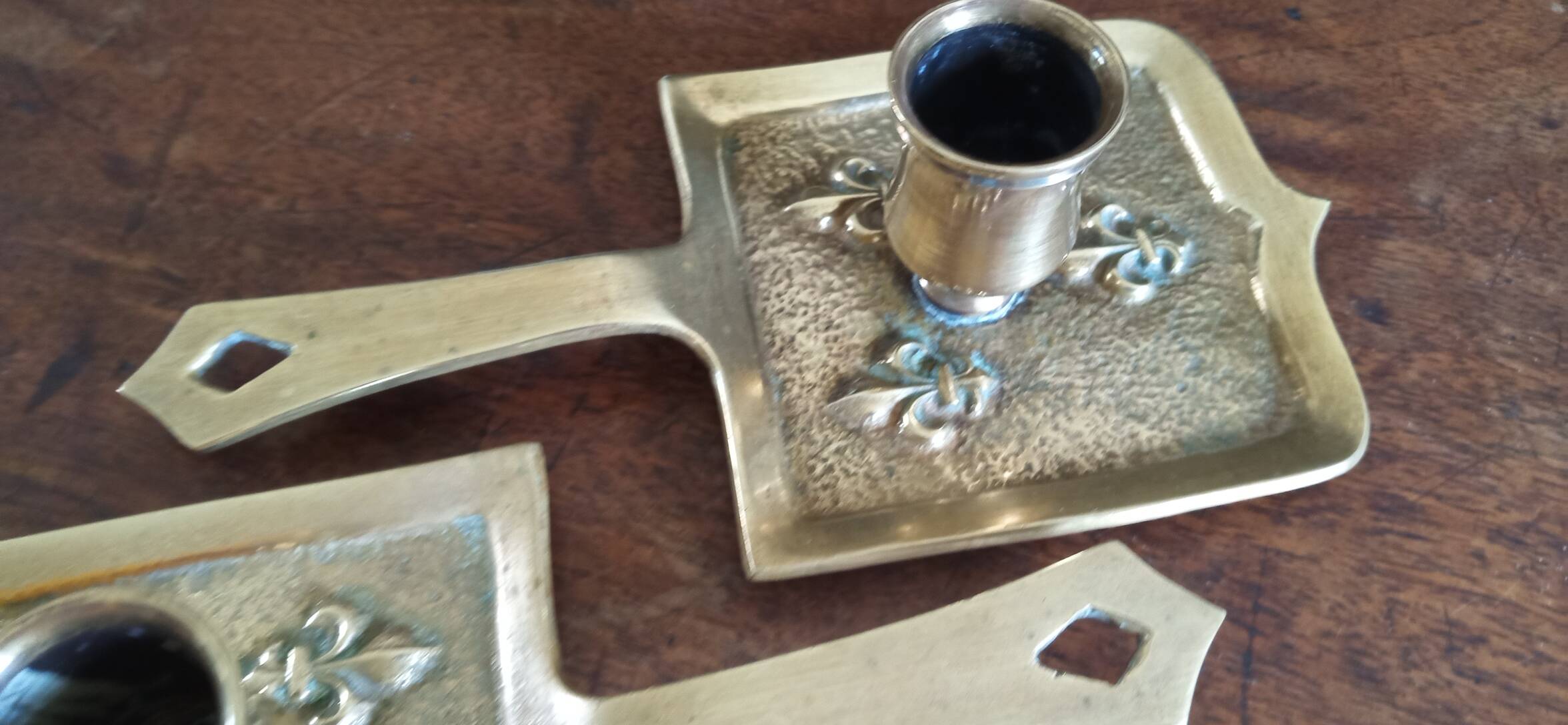 Pair of bronze candlesticks, fleur-de-lis