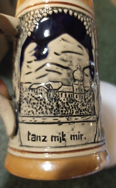 Two pitchers and a small original king beer mug