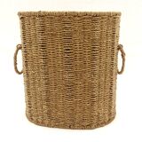 Braided straw wastepaper basket.