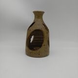 Stoneware candle holder.