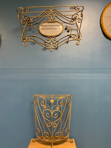 Coats and old umbrella holder