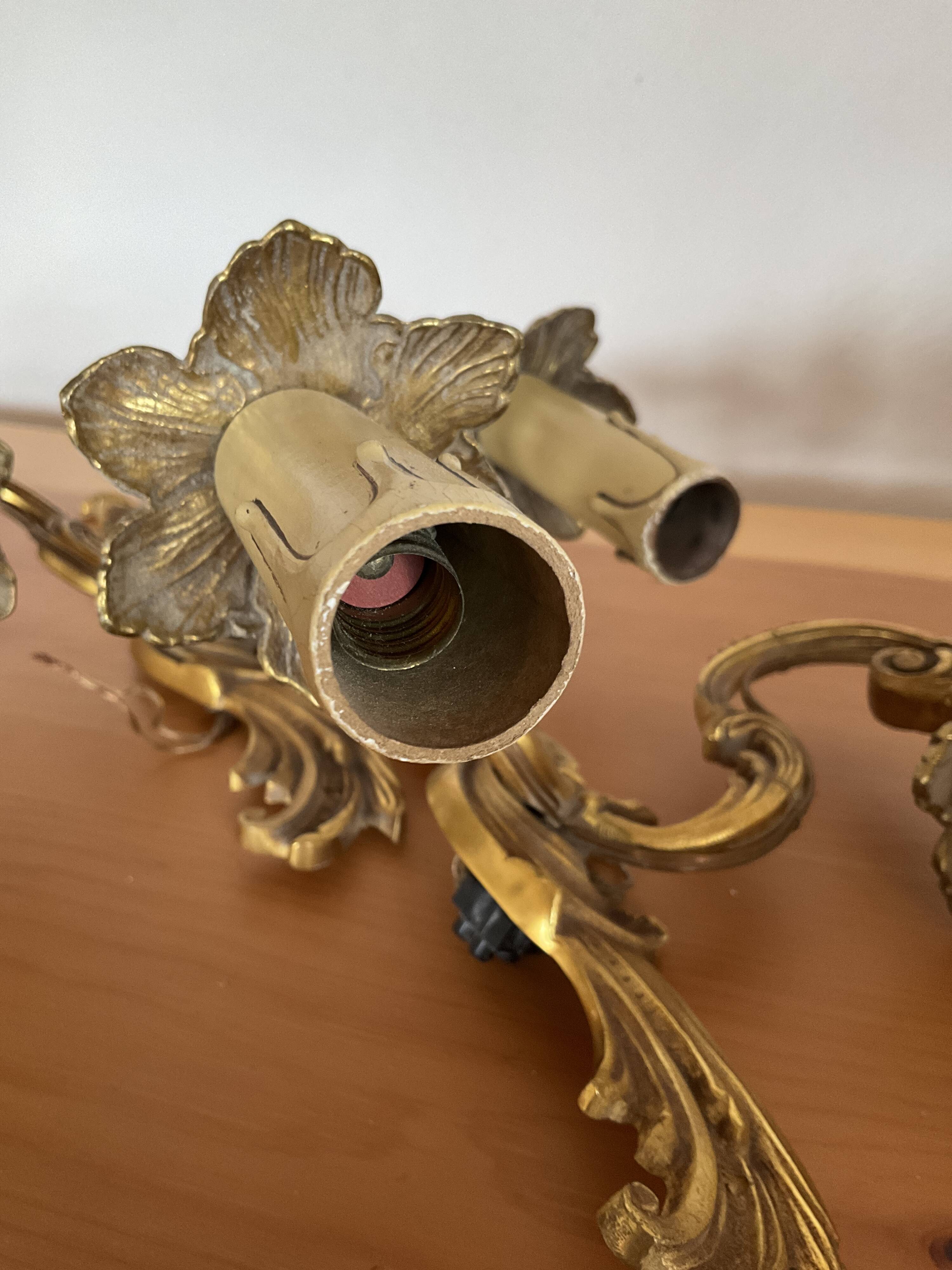 Pair of gilded bronze wall lights