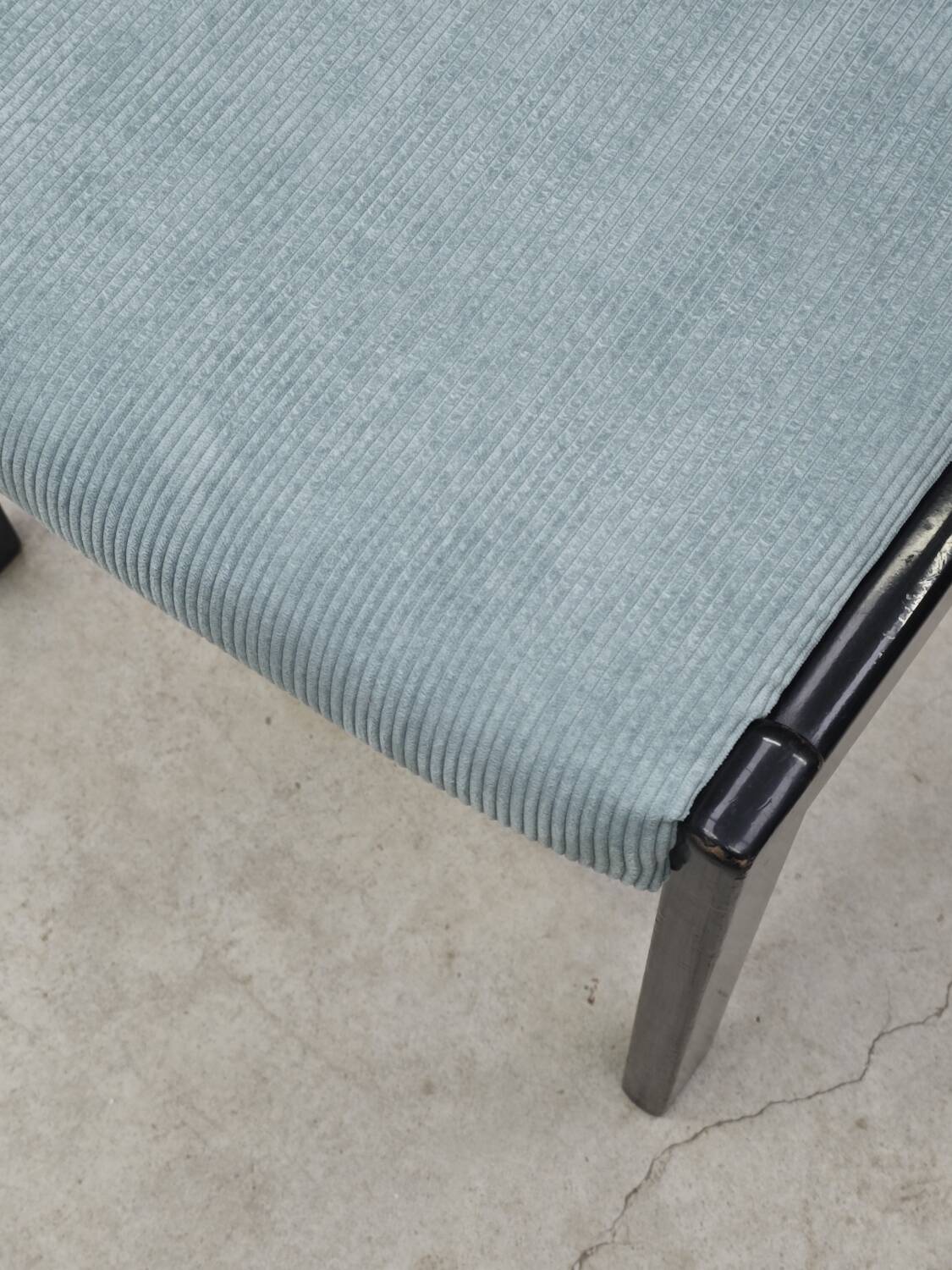 Set of 4 modernist black chairs with light blue ribbed fabric