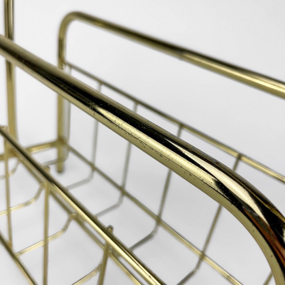 Graphic magazine holder in golden brass 70s