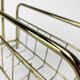 Graphic magazine holder in golden brass 70s