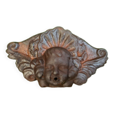 Cast iron wall fountain with a love